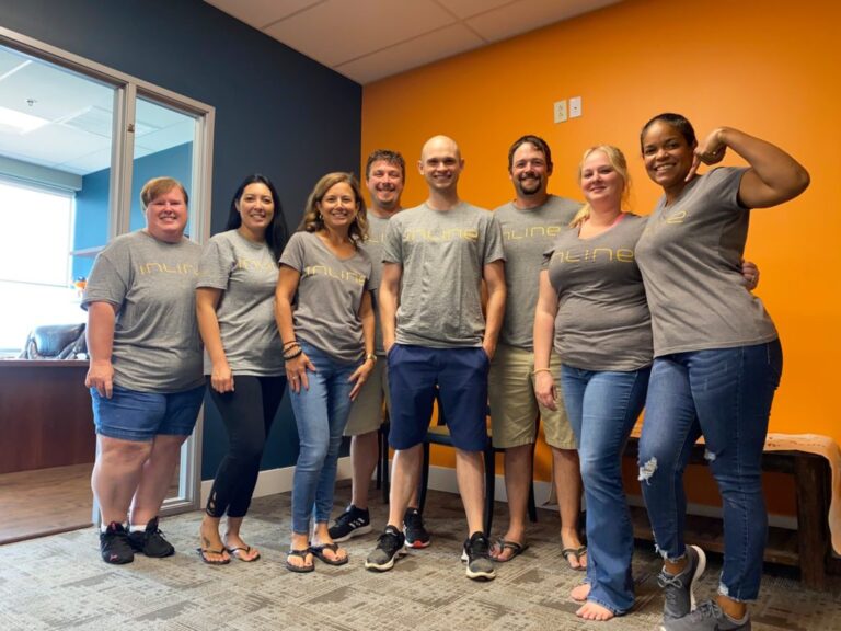 The Inline Data Systems team wearing Inline tee shirts.