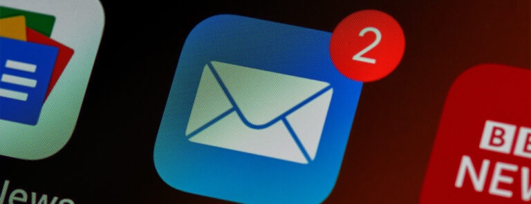 A mini-collage of icons, with an email envelope icon in the center; the number two shows above the icon.
